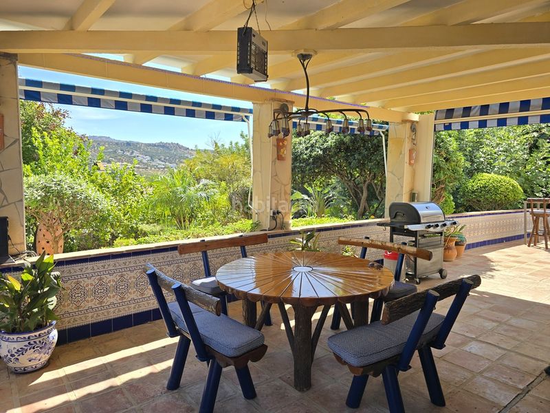 Foto b3e08f58-c55d-446b-b7f8-60576f9ba285. Casa con parcheggio piscina in Viñuela
