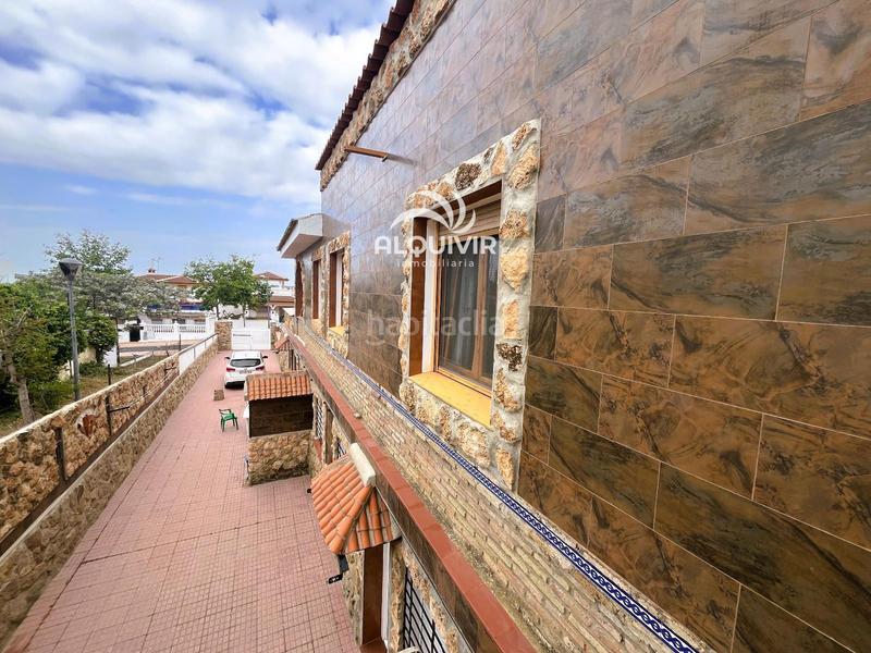 Foto 32f0a1f1-db9f-4f19-9ce8-6d85afec4444. Casa aparellada amb aparcament a Centro - Torre de la Higuera Almonte