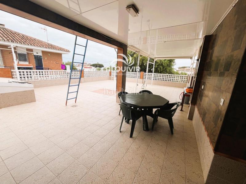 Foto c60d0b3f-0efe-46d2-a155-1b1434f9a4d3. Casa aparellada amb aparcament a Centro - Torre de la Higuera Almonte