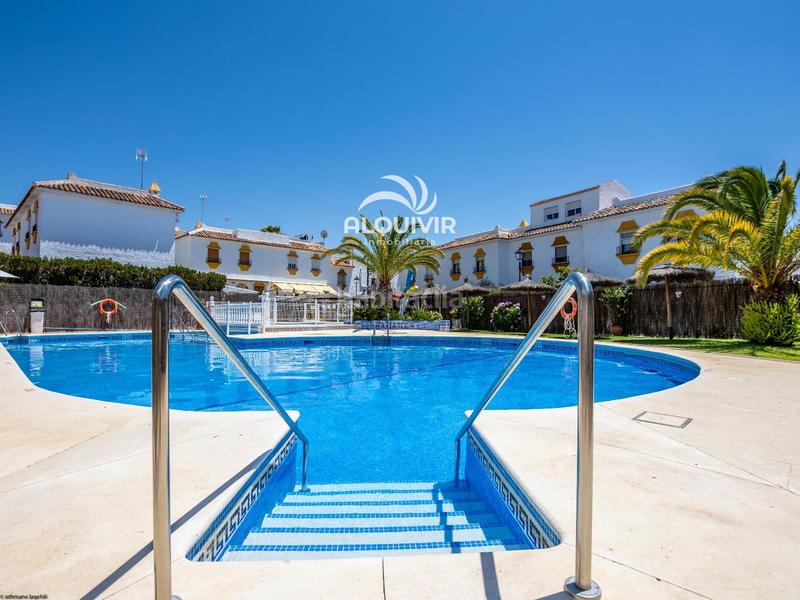 Foto 1bc07835-dd2a-43e4-a6e1-55f3b7ee43a4. Casa adosada chalet adosado, en venta en matalascañas. en urbanización privada con piscina comunitaria, zona Caño Guerrero. en Almonte
