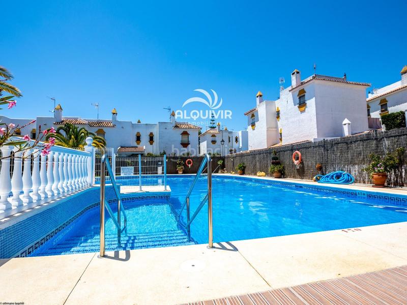 Foto 29f133b7-edae-45c0-bcea-9bd926a69eb0. Casa adosada chalet adosado, en venta en matalascañas. en urbanización privada con piscina comunitaria, zona Caño Guerrero. en Almonte