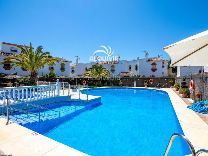 Foto eb04087d-c6ff-4b43-ba4a-0b8530d868f2. Casa adosada chalet adosado, en venta en matalascañas. en urbanización privada con piscina comunitaria, zona Caño Guerrero. en Almonte