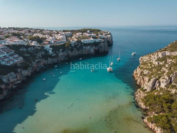 Foto 85d05d7a-78a6-419f-a2b7-28278305f3cd. Casa adossada amb calefacció aparcament a Cala en Porter Alaior