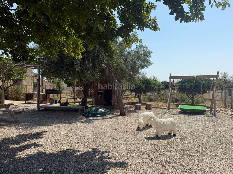Foto c5300325-2147-401b-9088-e24a776a8e33. Masia amb calefacció aparcament piscina a Campanet