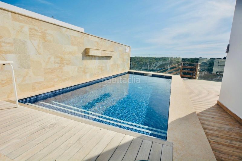 Foto 71c1b4ee-1a3a-44cf-94fb-adb2b3362a26. Casa adossada amb calefacció piscina a Cala en Porter Alaior