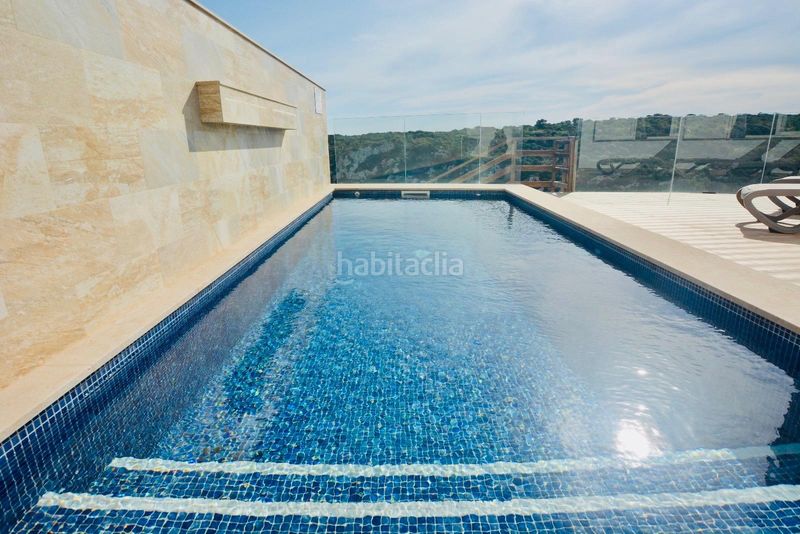 Foto f12dd729-e08a-4d0e-9a5e-11c1defb3dc3. Casa adossada amb calefacció piscina a Cala en Porter Alaior