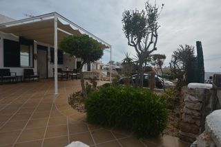 House in Biniancolla-Punta Prima. Dos casas adosadas en segunda linea de mar en sant lluís