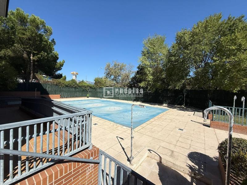 Foto 4913d17c-c8a5-4e73-addc-0968fa0ae6da. Flat with heating parking pool in Los Negrales Collado Villalba
