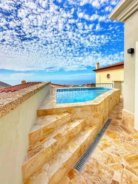 Foto c228356a-1e88-4b5c-aee6-7637528bb967. Chalet en calle caramillo 8 villa con vistas al mar en Chayofa en Arona