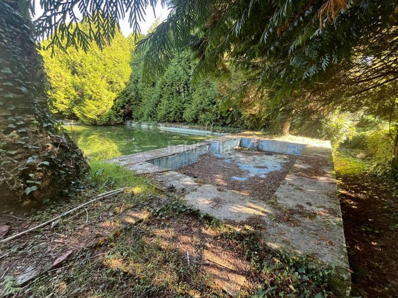 Foto d2e7fb2e-9cc2-42b6-b24e-c359d80616fa. Casa amb calefacció aparcament piscina a Parroquias de Santiago Santiago de Compostela