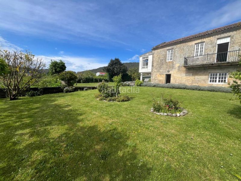 Foto 94ab32ae-f95f-432c-8d80-35c311dd32fb. Casa amb aparcament a Muros