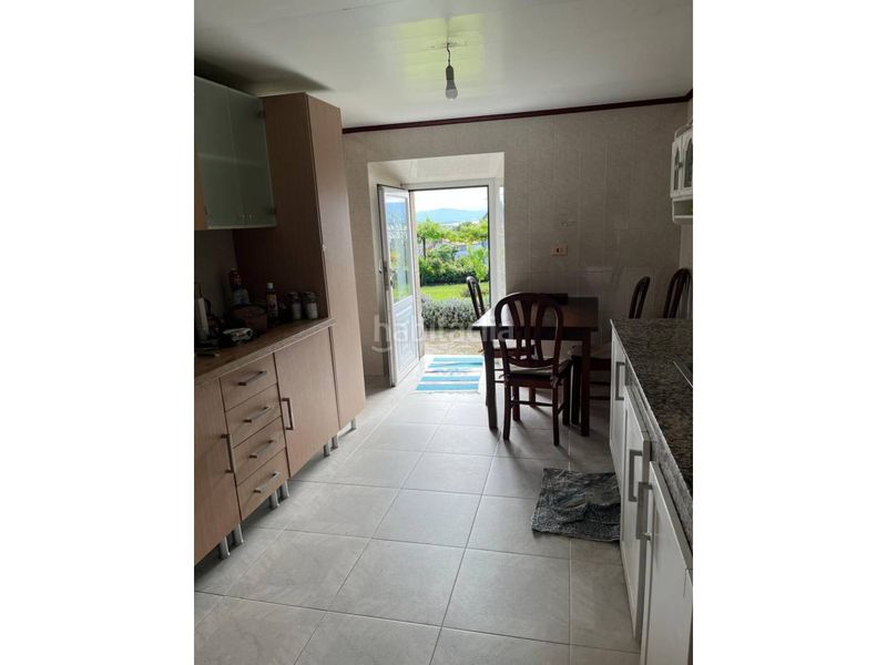 Foto bffe0529-ae88-46bc-a36c-b22533beb7ed. Casa amb aparcament a Muros