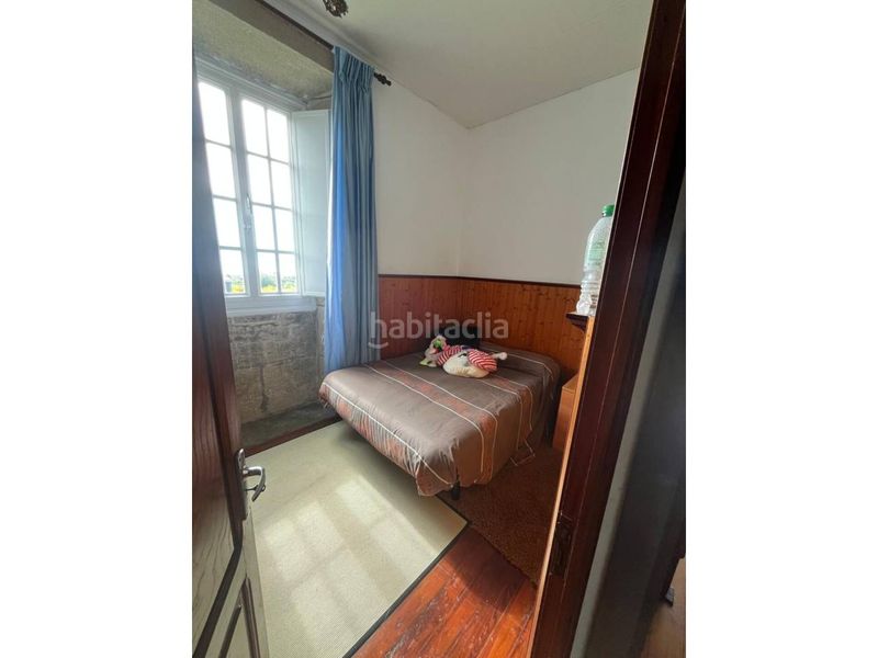 Foto cf935474-f20c-4fb1-afa8-c40970baaf97. Casa amb aparcament a Muros