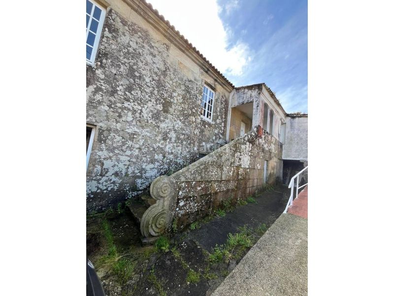 Foto d30f82f8-7581-4030-aaa3-97e48502d7c1. Casa amb aparcament a Muros