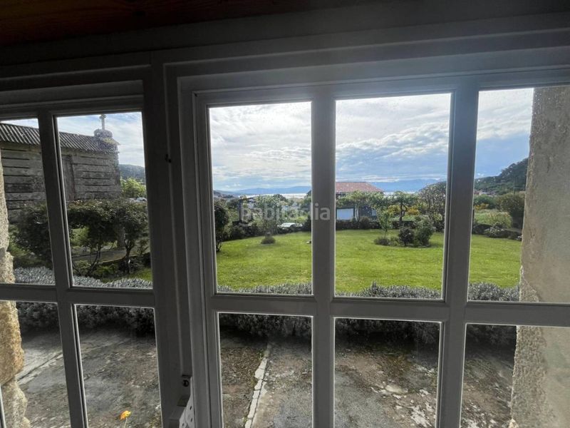 Foto d8c0cbf2-957e-4bbd-b44a-c50979a844df. Casa amb aparcament a Muros