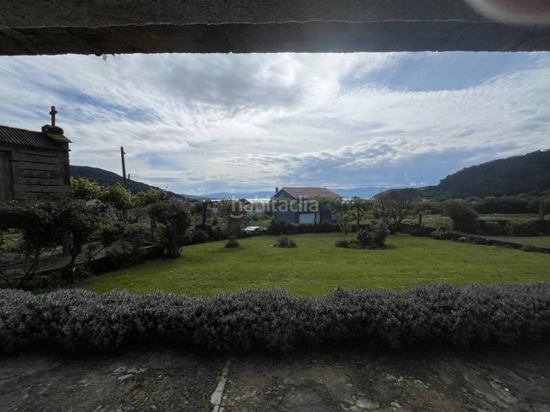 Foto daa207e1-2f90-44f5-af03-3201a864334f. Casa amb aparcament a Muros