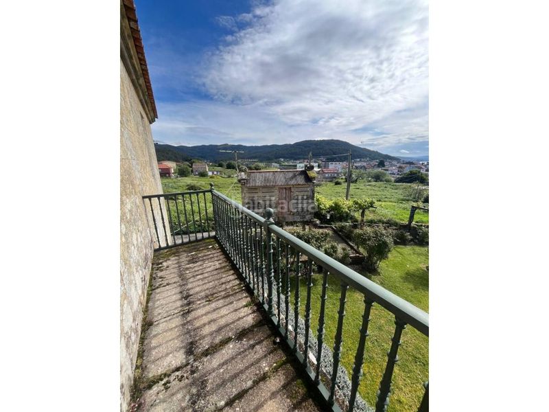 Foto f910b95d-54a2-424a-8ad8-4542bdf47290. Casa amb aparcament a Muros