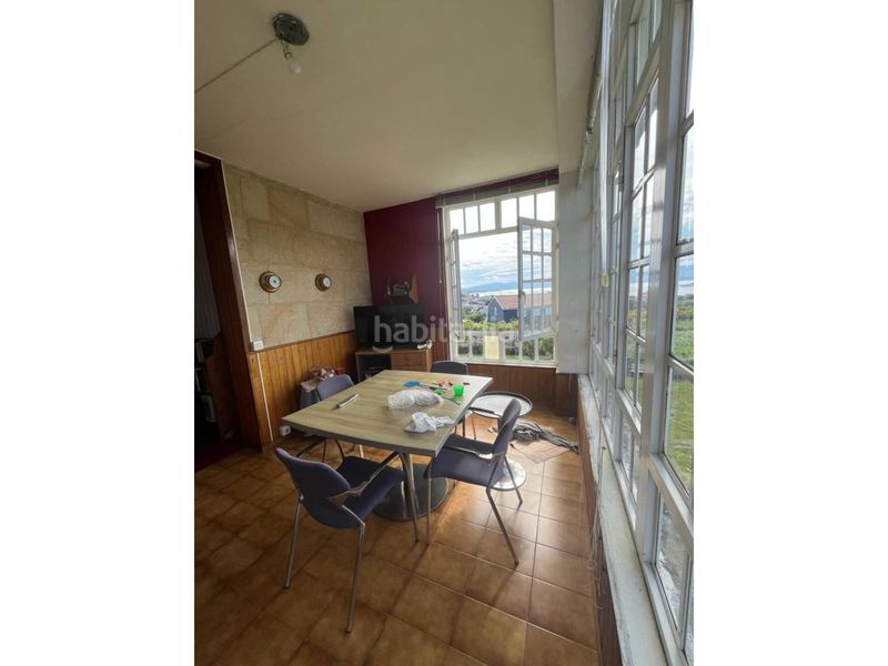 Foto fbc010a5-9ae3-49c9-93e3-814c1bbed1a1. Casa amb aparcament a Muros