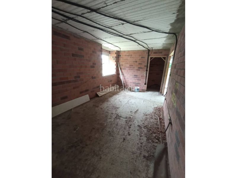Foto c208e971-6907-4408-8805-27619993b019. Casa amb aparcament a Abegondo