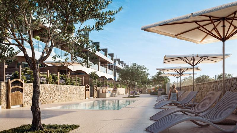 Foto a05f4669-a0bd-4426-82e7-1c4c0451801f. Reihenhaus mit heizung parking pool in Fornells Es Mercadal