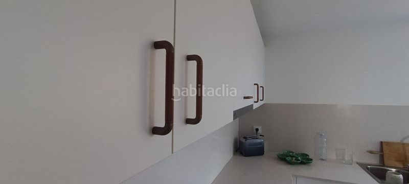 Foto 7ad7e687-2268-48bd-b9d8-be794ecab53c. Casa adossada amb calefacció aparcament piscina a Es Mercadal