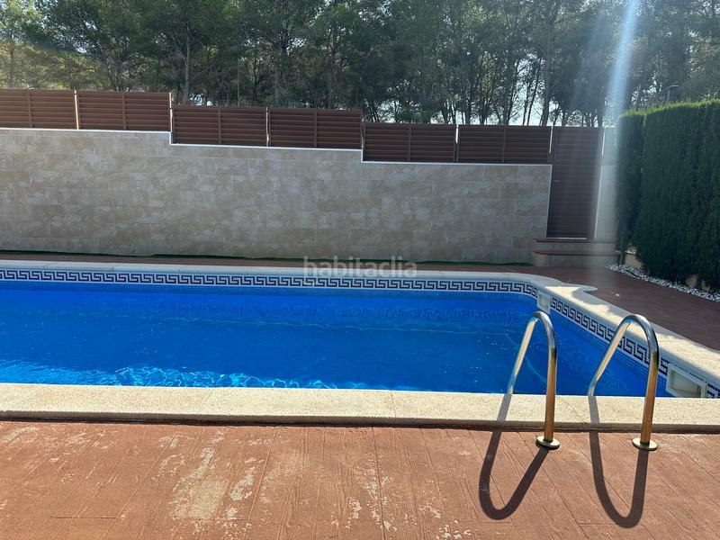 Foto 847c91d4-8e79-44dd-a6e4-15d2199e3c41. Casa aparellada amb xemeneia calefacció aparcament piscina a Pallaresos (Els)