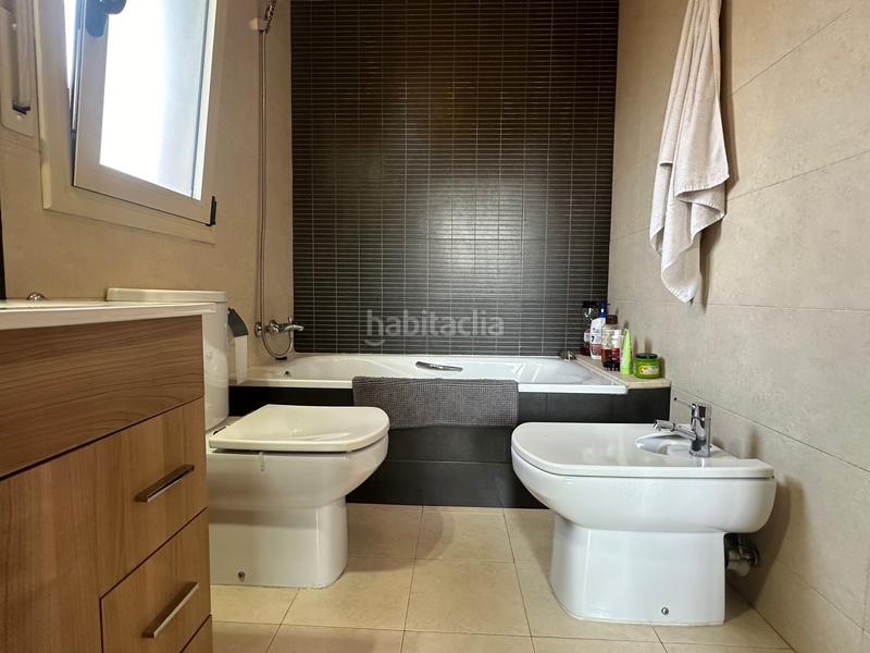 Foto a88cba04-8ab4-4967-9fab-7a11482a4e88. Casa aparellada amb xemeneia calefacció aparcament piscina a Pallaresos (Els)