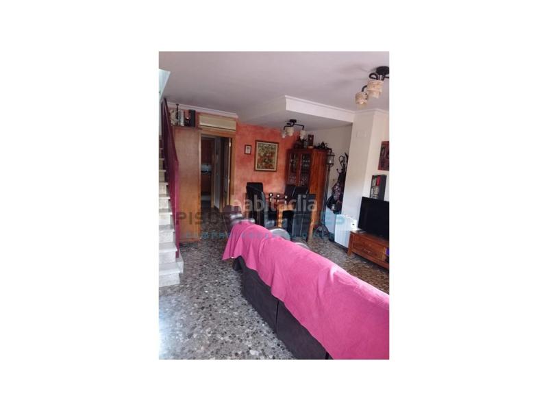 Foto a2e98d00-722c-41a4-beb7-88900fa8c8c6. Casa adossada amb aparcament piscina a Avenida de Abril-9 de Octubre Sagunt