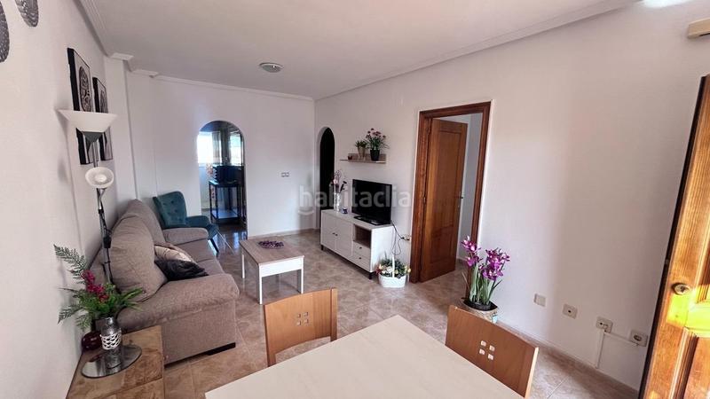 Foto 25fb314c-e45a-4fb3-accb-51d25a9d94d2. Piccolo appartamento con parcheggio piscina in Los Balcones y los Altos Orihuela