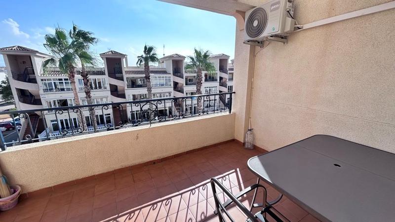 Foto 5349021a-c059-4c82-89c4-59a76cf3c90e. Piccolo appartamento con parcheggio piscina in Los Balcones y los Altos Orihuela