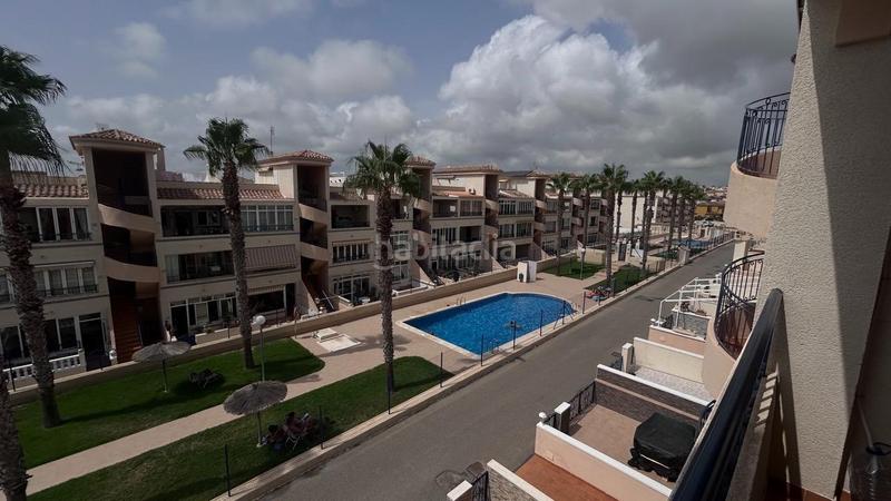 Foto 9707a3af-aa35-405b-b928-2e33c8e959e0. Piccolo appartamento con parcheggio piscina in Los Balcones y los Altos Orihuela