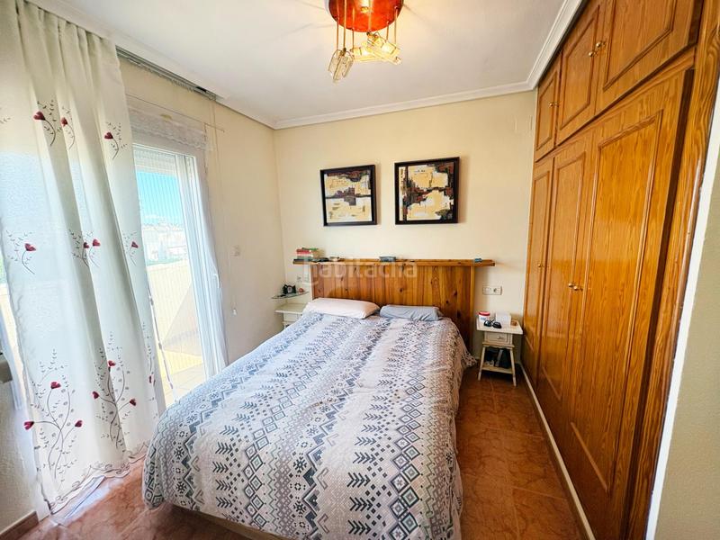 Foto 9e3a6c9c-0d23-4d37-89ab-95786e2ff020. Casa aparellada amb aparcament piscina a Los Balcones-Los Altos Torrevieja