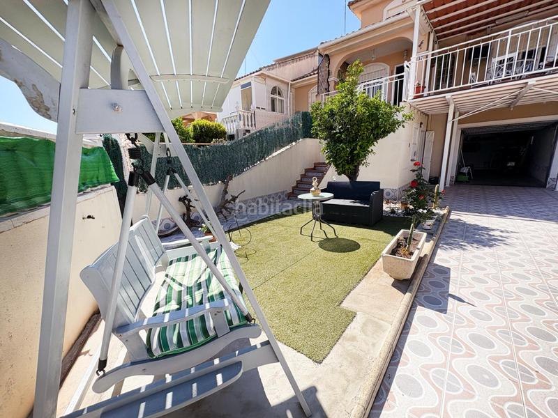 Foto a7dcf3d7-cb7d-4f6c-9418-8209c6a5e45e. Casa aparellada amb aparcament piscina a Los Balcones-Los Altos Torrevieja