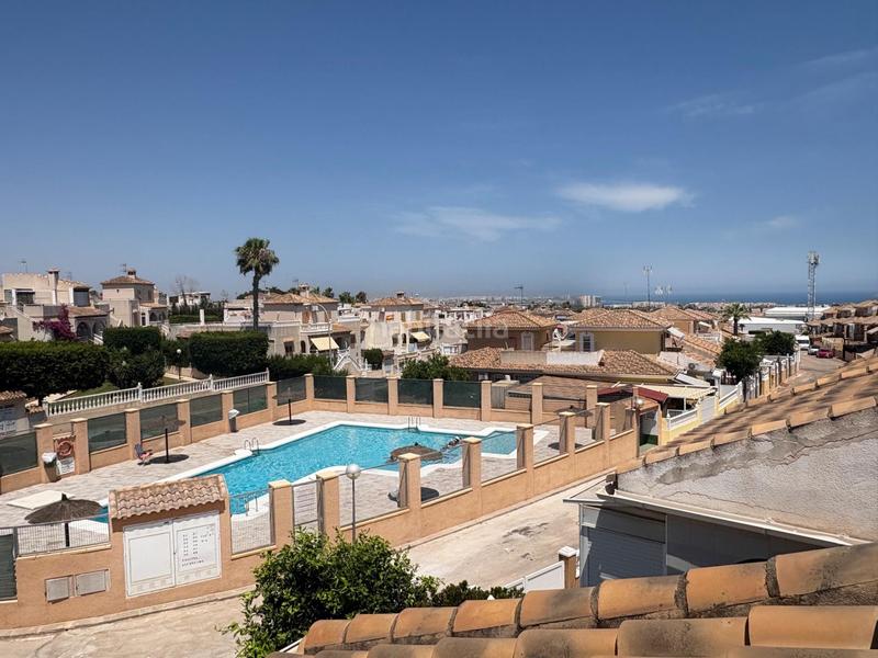 Foto b119f704-db8e-46e1-9d7c-97d1fcaed5cd. Casa aparellada amb aparcament piscina a Los Balcones-Los Altos Torrevieja