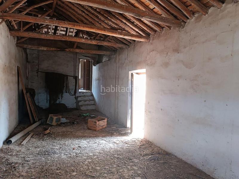 Foto 172a11c9-8c49-402b-b6a4-4da0c5fa1b42. Casa una casa con historia que espera tu visión! en Pinos Puente