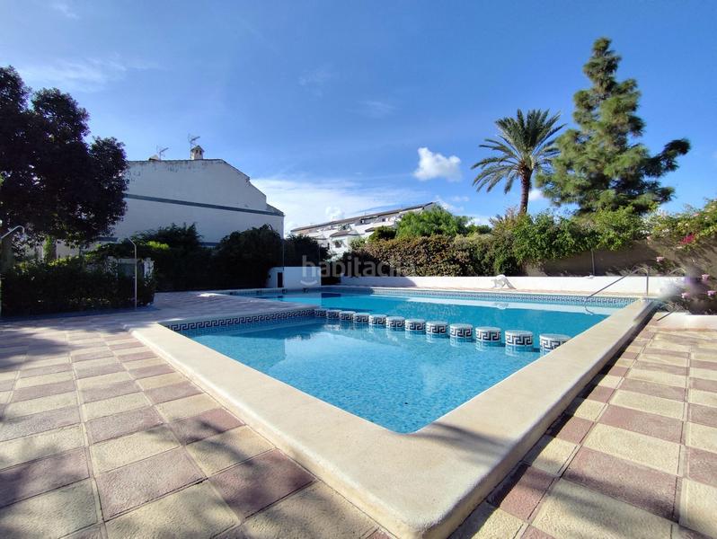 Foto adc1f62c-d1a9-4bbe-ad16-5f7623892c05. Casa a schiera con parcheggio piscina in Playa Muchavista Campello (el)