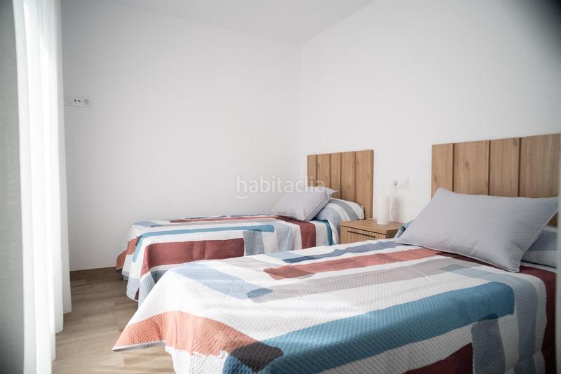 Foto c4f77c51-4b1d-4e55-98c0-baa3c6e96778. Casa adossada amb aparcament a San Javier San Javier