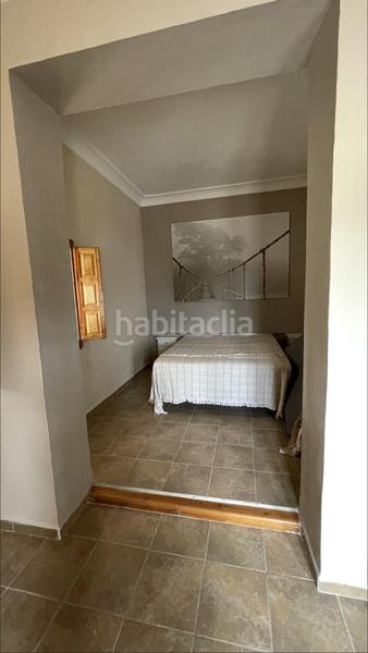 Foto f3b21df2-6fd2-4a3a-b3c7-60884e71cc2e. Casa amb aparcament piscina a La Nucia Pueblo Nucia (la)