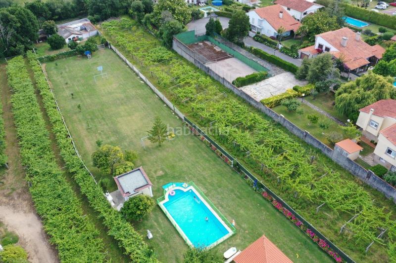 Foto 019e9d02-2769-432d-9611-b2ced5ab15a7. Maison avec chauffage parking piscine dans Sanxenxo pueblo Sanxenxo