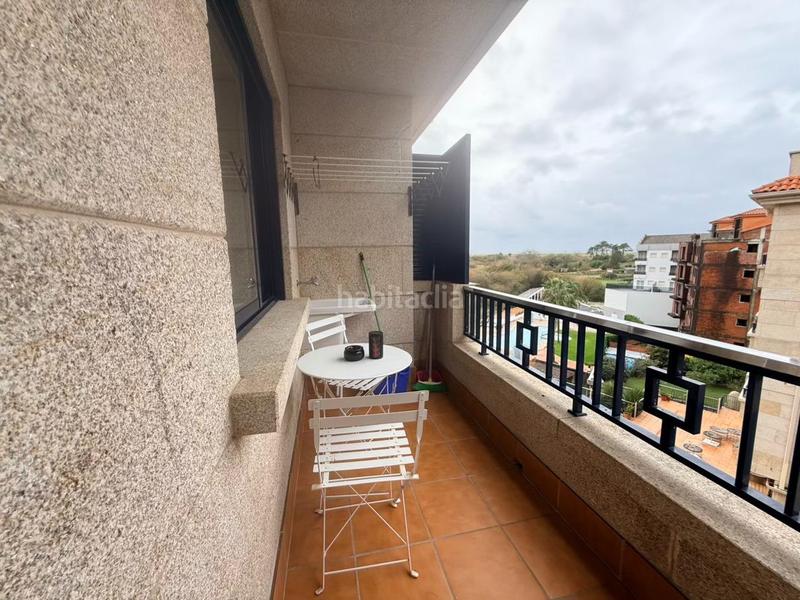 Foto 7ea0a335-7cb5-4c8f-b70e-9a7f78cbb7c8. Pis amb calefacció aparcament piscina a Noalla Sanxenxo