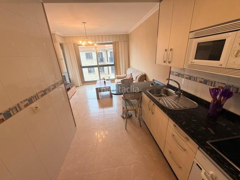 Foto 8822dea1-9e00-42e1-bff7-a0f85f5d35c0. Pis amb calefacció aparcament piscina a Noalla Sanxenxo