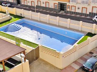 Appartement  Rosita ferrer (m). Bajo con terraza, garaje y piscina en urbanización roquetas. lis