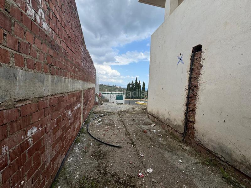 Foto e3f20917-1a4c-4c1e-b0d4-80b3ba3ecc1c. Casa a schiera con parcheggio in Manilva pueblo Manilva