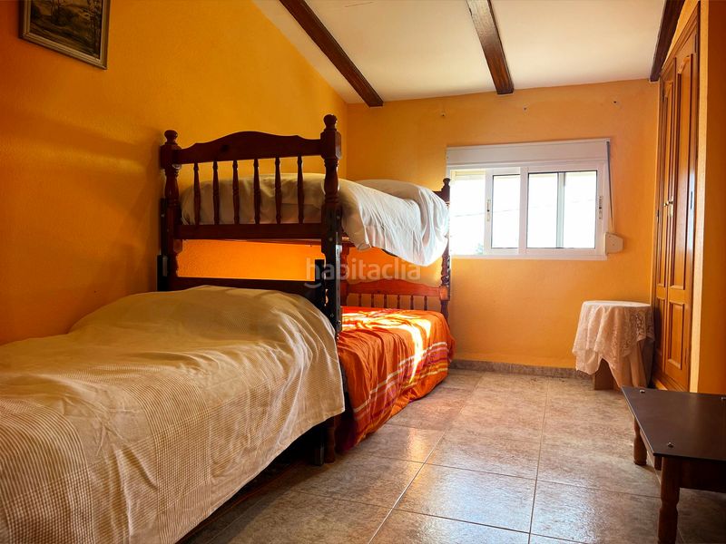 Foto 4a07eb4a-14ea-46b1-8087-6cb9552f206c. Casa amb aparcament a Vilamarxant