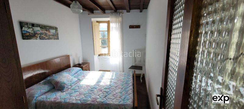 Foto 031f1074-6bda-4168-848f-87a41e65f644. Casa adossada amb aparcament a Valadouro (O)