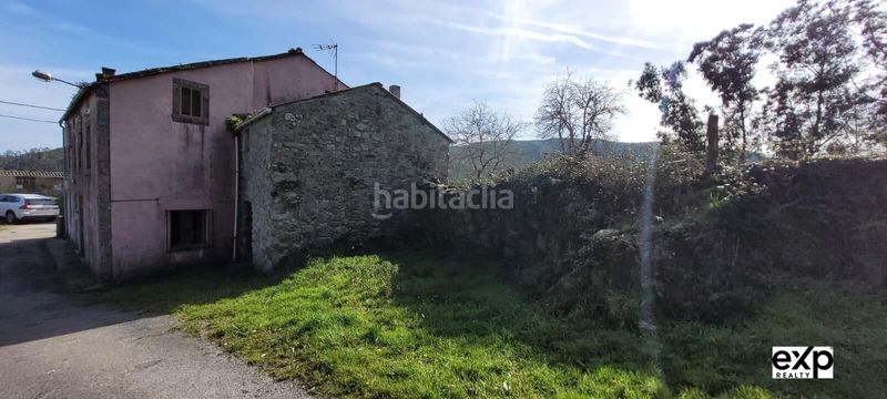 Foto 33094758-160b-4d3b-89fb-12a821dffc60. Casa adossada amb aparcament a Valadouro (O)