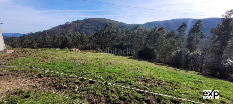 Foto 45373edf-a1a2-4d9f-b9f9-be269af9771e. Casa adossada amb aparcament a Valadouro (O)