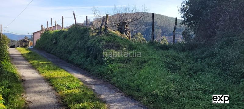 Foto 625f2cc3-2659-49f4-8617-18ff79a4bce5. Casa adossada amb aparcament a Valadouro (O)