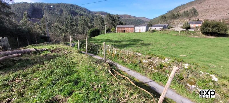 Foto 7c65aeff-1160-4f26-b65a-d19f774c8d8e. Casa adossada amb aparcament a Valadouro (O)