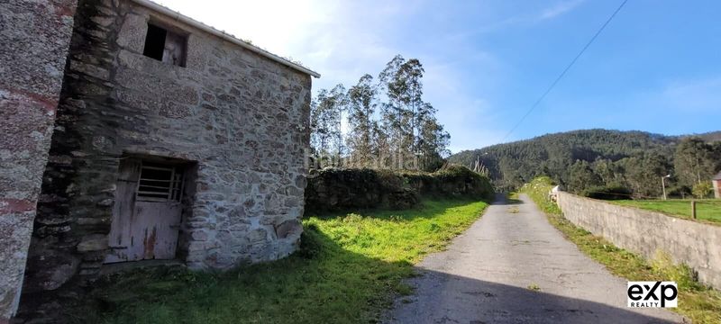 Foto 901eb1ee-9940-4853-ab5e-4e5667c50ee0. Casa adossada amb aparcament a Valadouro (O)